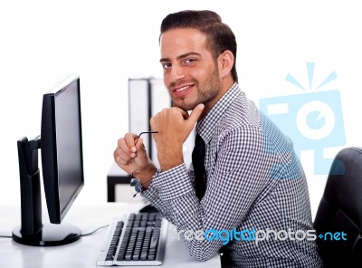 Young Business Man At The Office Stock Photo