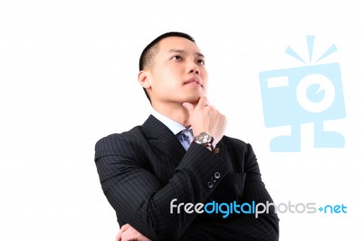 Young Business Man Thinking Stock Photo