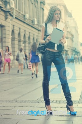 Young Business Woman With Tablet Computer Walking On Urban Stree… Stock Photo