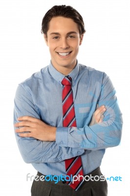 Young Businessman Arms Crossed Stock Photo