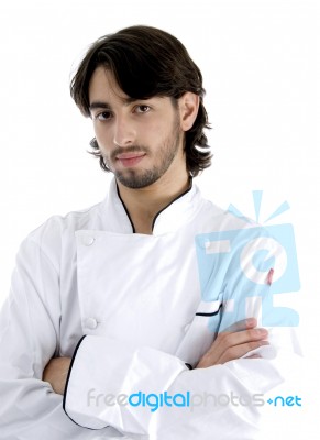 Young Chef Posing With His Arms Crossed Stock Photo