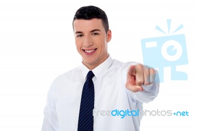 Young Corporate Guy Pointing At You Stock Photo