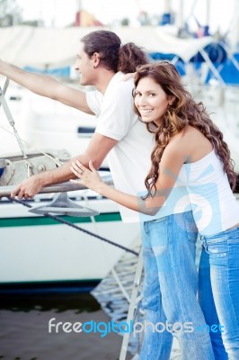 Young Couple At Boat Harbour Stock Photo