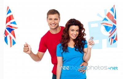 Young Couple Holding UK Flag Stock Photo