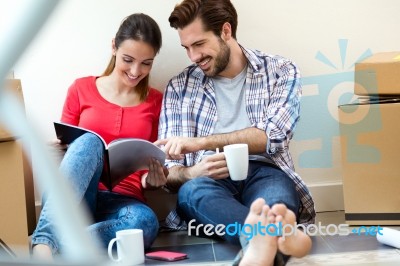Young Couple Moving In New Home Stock Photo