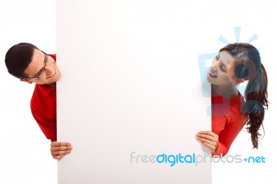 Young Couple Peeping Stock Photo