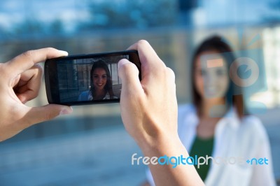 Young Couple Taking Photos With Mobile Stock Photo