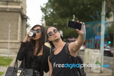Young Couple Taking Selfies Stock Photo