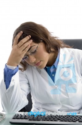 Young Doctor In Tension Stock Photo