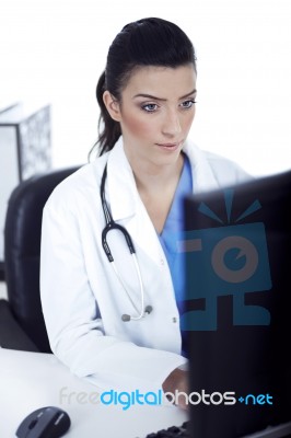 Young Doctor Working In The Computer Stock Photo
