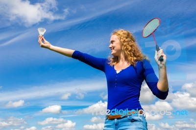 Young Dutch Woman Holding Shuttle And Badminton Racket Stock Photo