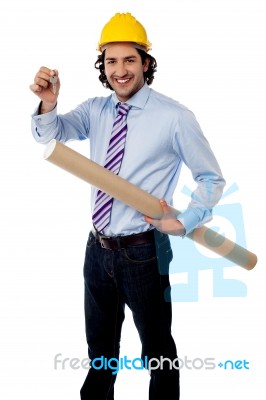 Young Engineer With Key And Blueprint Stock Photo