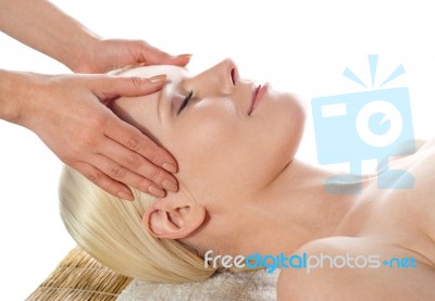 Young Female Getting Head Massage Stock Photo