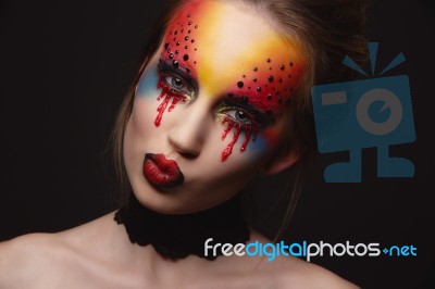 Young Female Model With Bloody Eyes Makeup Stock Photo