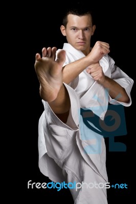 Young Fighter On Black Stock Photo