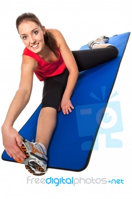 Young Fit Woman Exercising Stock Photo