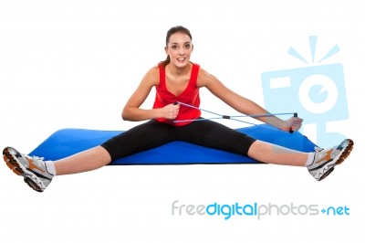 Young Fit Woman Exercising Stock Photo