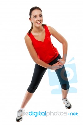 Young Fit Woman Exercising Stock Photo