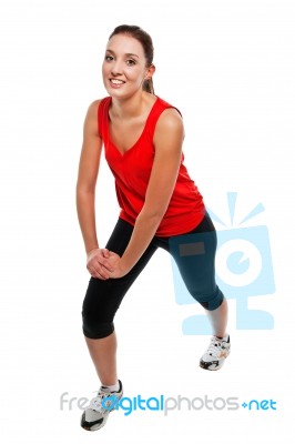 Young Fit Woman Exercising Stock Photo