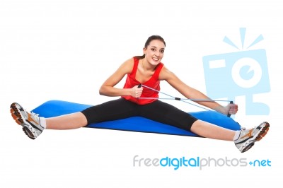 Young Fit Woman Exercising Stock Photo