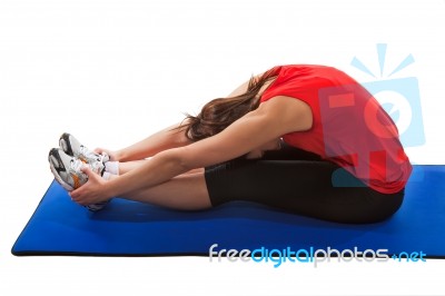 Young Fit Woman Exercising Stock Photo