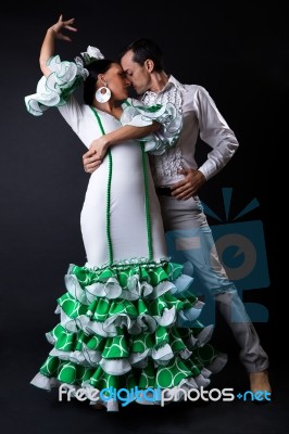 Young Flamenco Dancers In Beautiful Dress On Black Background Stock Photo