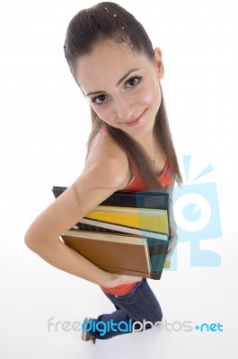 Young Girl Holding Notebook Stock Photo