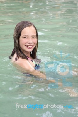 Young Girl In Pool Stock Photo