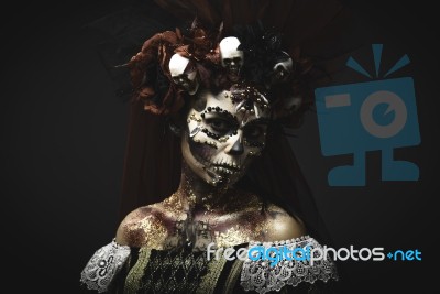 Young Girl In The Image Of Santa Muerte Stock Photo