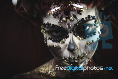 Young Girl In The Image Of Santa Muerte Stock Photo