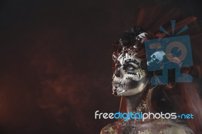 Young Girl In The Image Of Santa Muerte Stock Photo