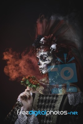 Young Girl In The Image Of Santa Muerte Stock Photo