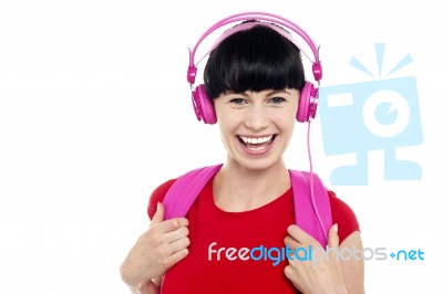 Young Girl Listening To Music, Using Headphones Stock Photo