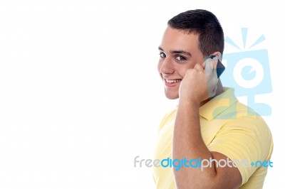 Young Guy Communicating With Friend Stock Photo