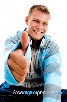 Young Happy Male With Headphones And Thumbs Up Stock Photo