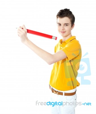 Young Kid Writing On Wall Stock Photo