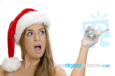 Young Lady Wearing Christmas Hat Stock Photo