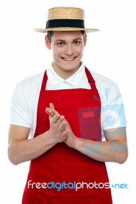 Young Male Chef Wearing Hat Stock Photo