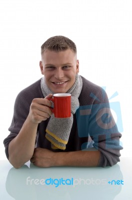 Young Male Holding Coffee Mug Stock Photo - Royalty Free Image ID 100102236