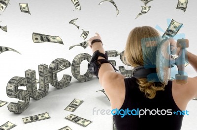 Young Male Looking At Flying Dollars And Holding Skateboard Stock Photo