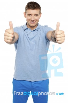 Young Male Showing Thumbs Up Stock Photo