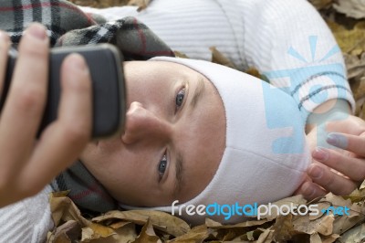 Young Man And A Mobile Phone Stock Photo