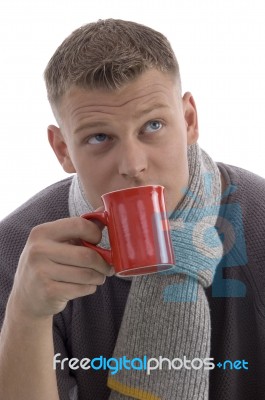 Young Man Drinking Coffee Stock Photo