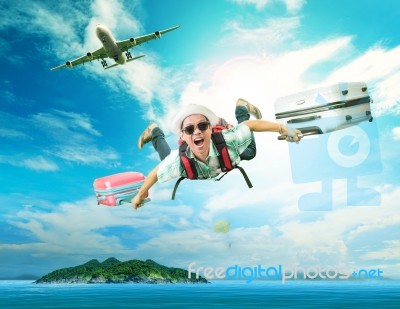 Young Man Flying From Passenger Plane To Natural Destination Isl… Stock Photo