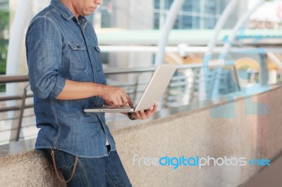 Young Man Holding Notebook Working Stock Photo