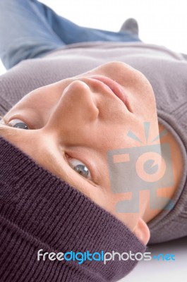 Young Man Lying On Floor Stock Photo