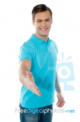 Young Man Offering Handshake Stock Photo