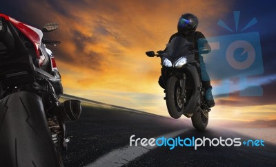 Young Man Riding Motorcycle On Asphalt Highways Road With Profes… Stock Photo