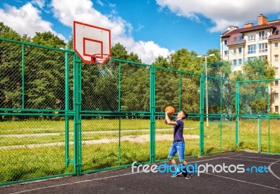 Young Man Training In Basketball Stock Photo