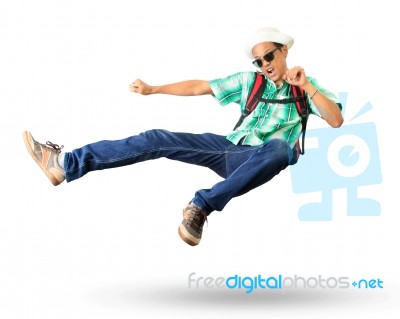 Young Man With Back Pack Sky Kick Jumping Action Isolated White Stock Photo